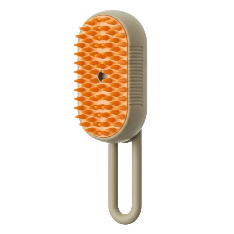Pet grooming brush with orange bristles on a beige handle against a white background
