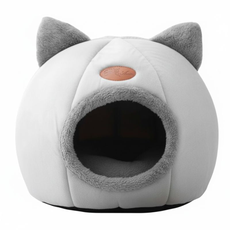White and gray pet bed with cat ears on a white background