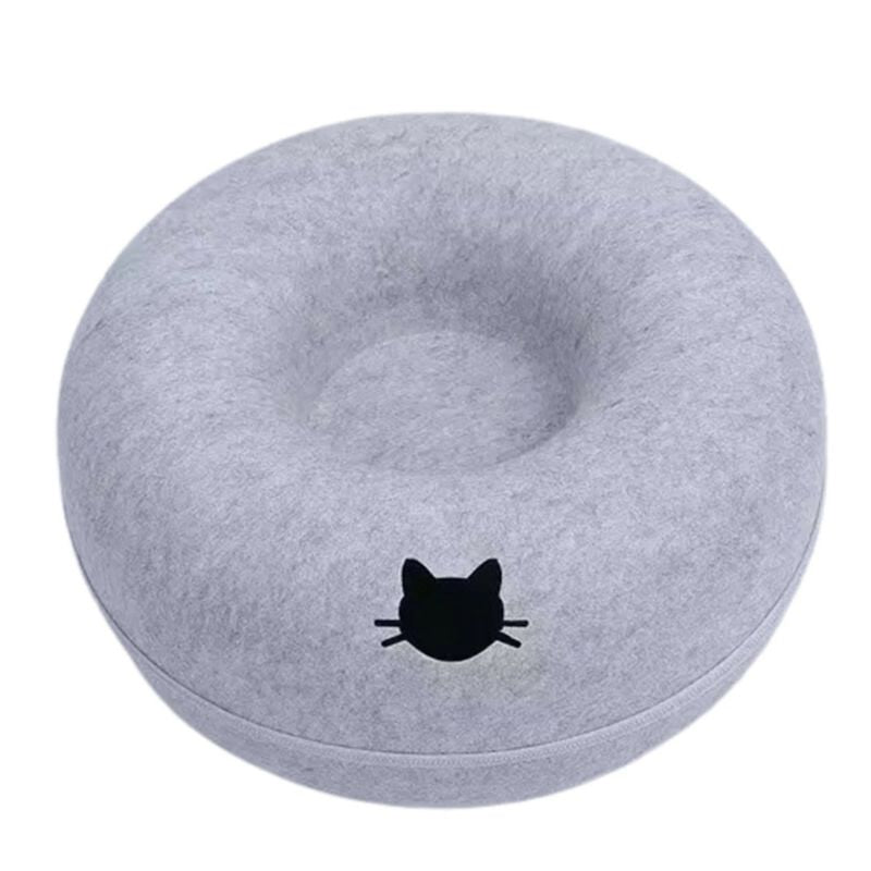 Gray donut-shaped pillow with a black cat face design on a white background