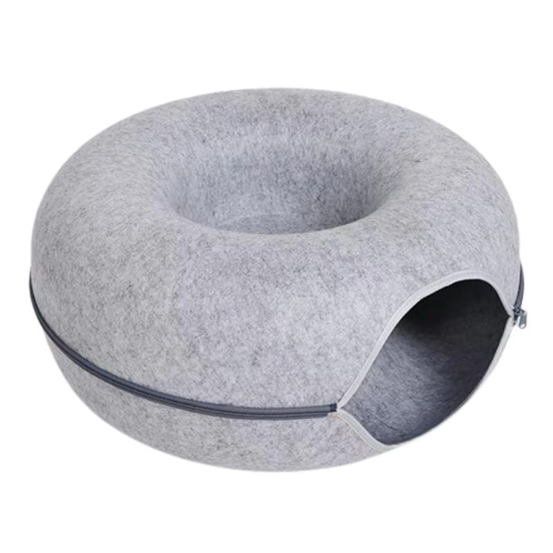 Gray donut-shaped pet bed on a white background