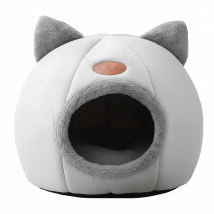 White and gray pet bed with cat ears on a white background