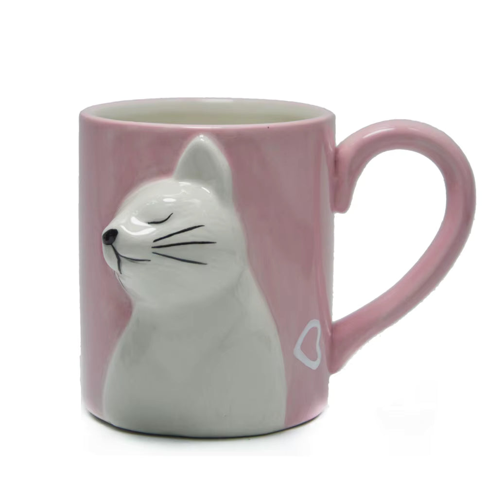 Pink mug with a cat design on a white background