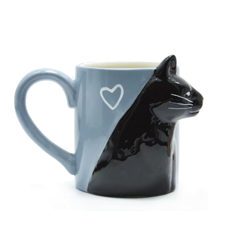 Cat-shaped mug with a heart design on a white background