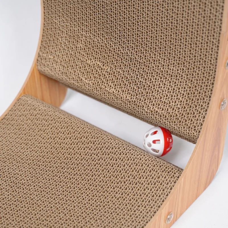 Brown cat scratcher with a red and white ball inside on a white background