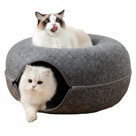 Two cats inside a gray pet bed on a white background