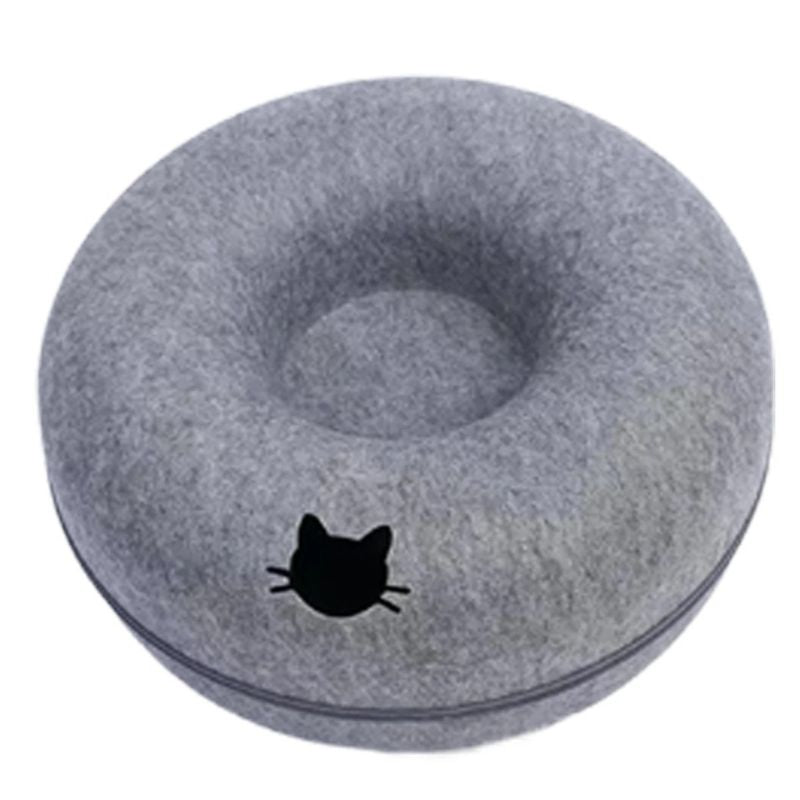 Gray donut-shaped pet bed with a black cat silhouette on a white background