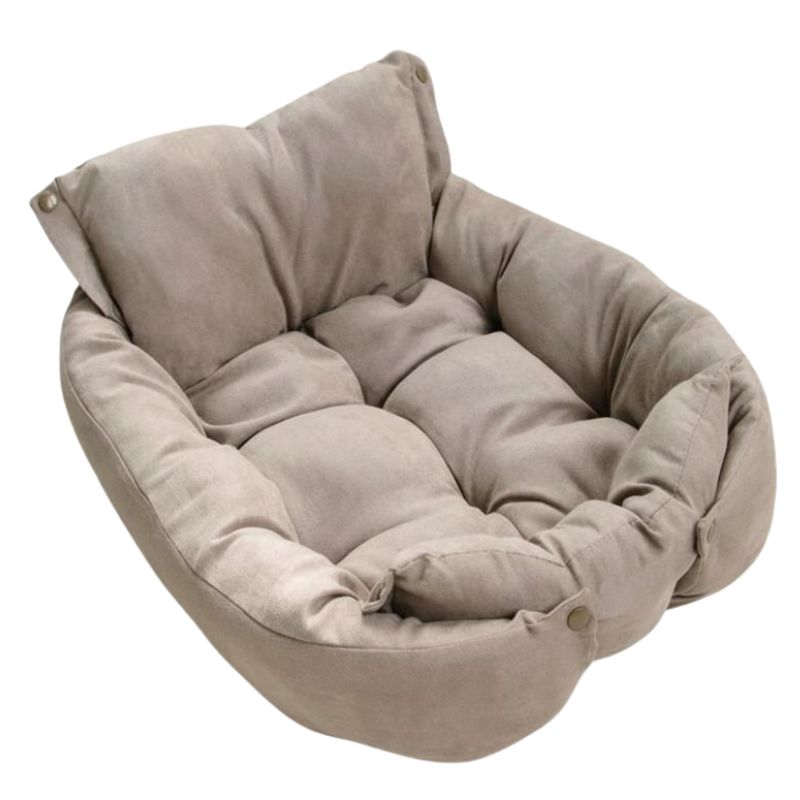 Beige pet bed with a soft texture on a white background