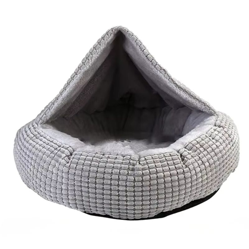 Gray pet bed with a textured surface on a white background