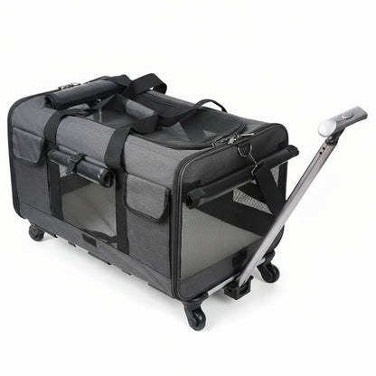 Gray pet travel crate with wheels and a handle on a white background
