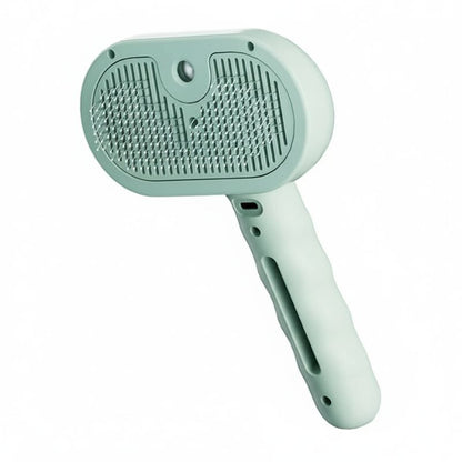Mint green pet grooming brush on a white background