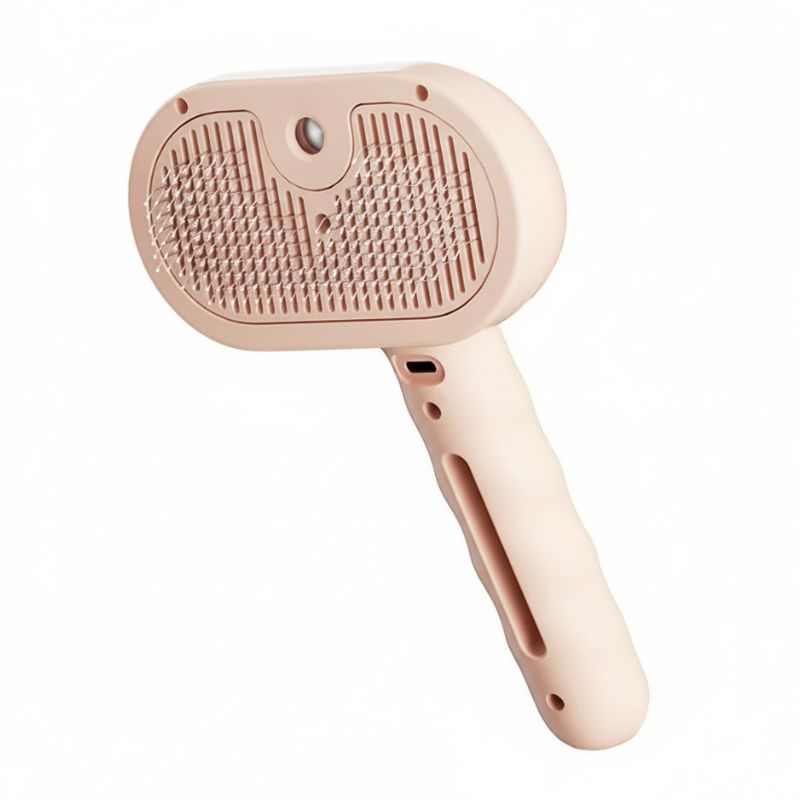 Beige pet grooming brush on a white background