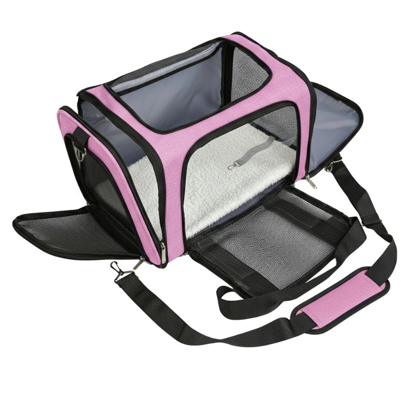Pink and black pet carrier with a white interior on a white background