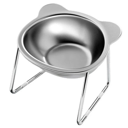 Stainless steel pet bowl on a stand with a white background