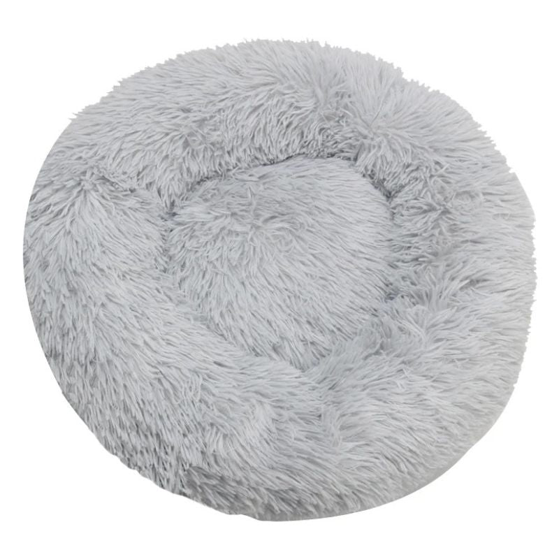 Fluffy gray pet bed on a white background