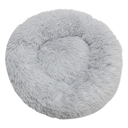 Fluffy gray pet bed on a white background