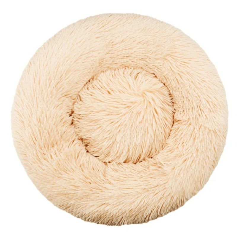Beige fluffy ball of yarn on a white background