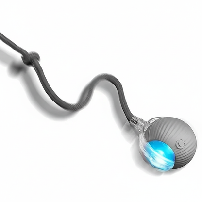 Gray electronic device with a blue light on a white background